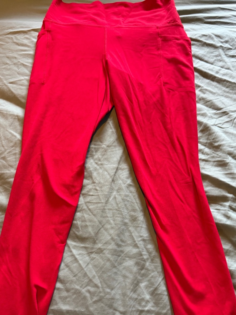 Red Athleta salutation stash 7/8 length leggings